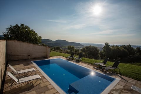 Property building, Living room, Swimming pool