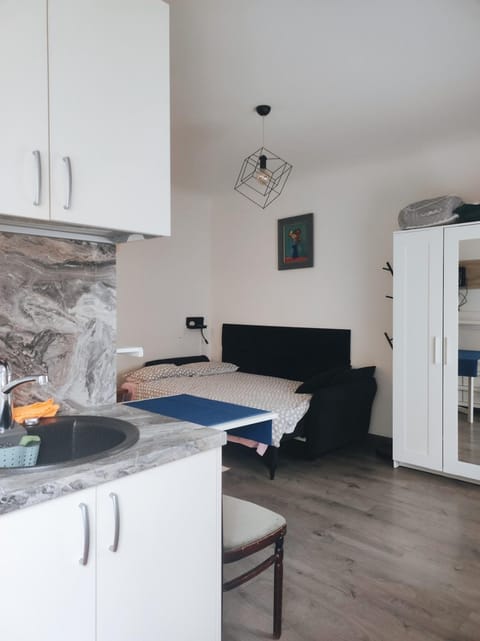 Bed, Living room, Seating area, Bedroom