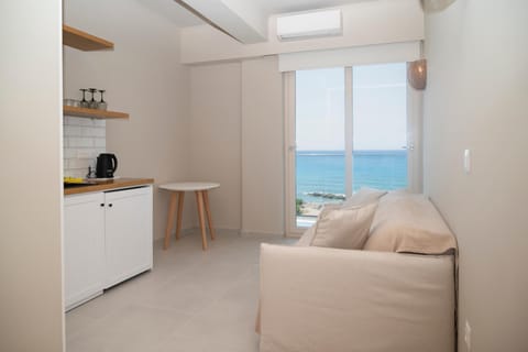 Natural landscape, Kitchen or kitchenette, Living room, Seating area, Dining area, Sea view