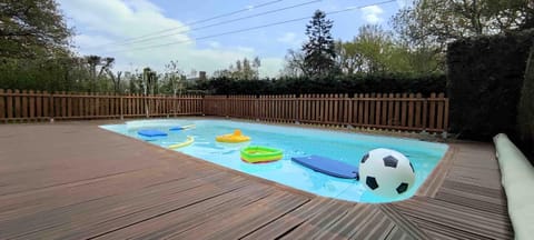 Property building, Living room, Swimming pool