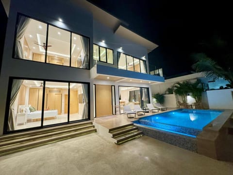 Property building, Patio, Night, Balcony/Terrace, Pool view, Swimming pool, sunbed