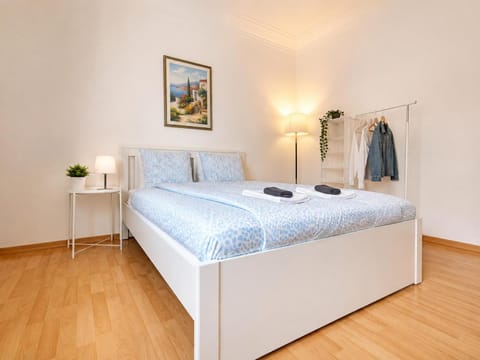 Photo of the whole room, room service, towels, wardrobe