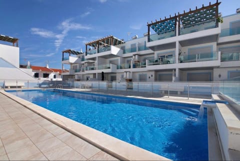 Property building, Living room, Swimming pool