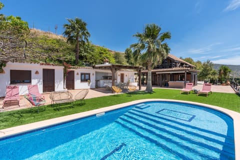 Property building, Living room, Swimming pool