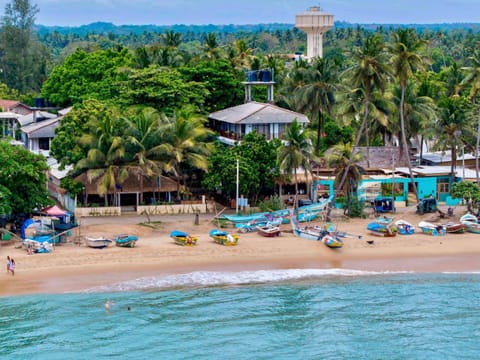Property building, Nearby landmark, Restaurant/places to eat, Restaurant/places to eat, Day, People, Natural landscape, Garden, Garden, Coffee/tea facilities, Beach, Beach, Garden view, Sea view, Sea view, Buffet breakfast, Parking, internet, sunbed, laundry, air conditioner