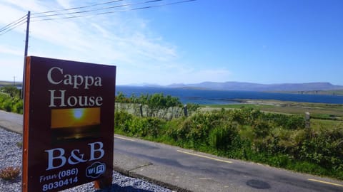 Facade/entrance, Property logo or sign, Garden, Sea view