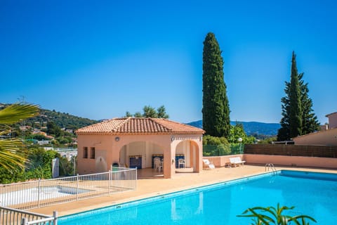 Property building, Living room, Swimming pool