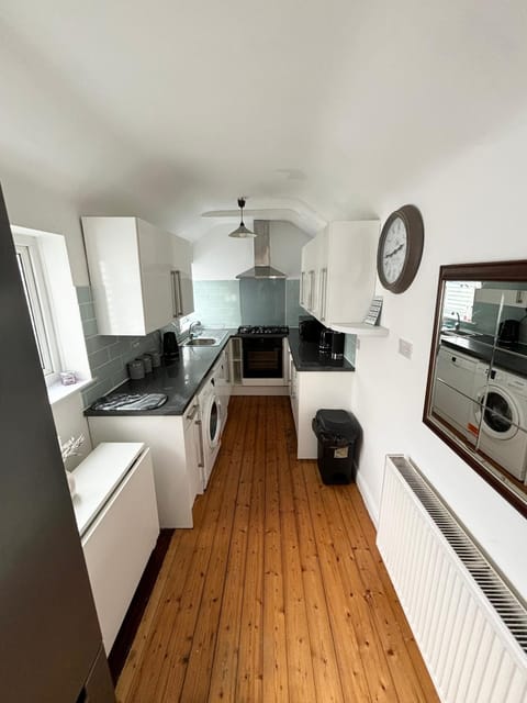 Kitchen or kitchenette, oven, stove, toaster