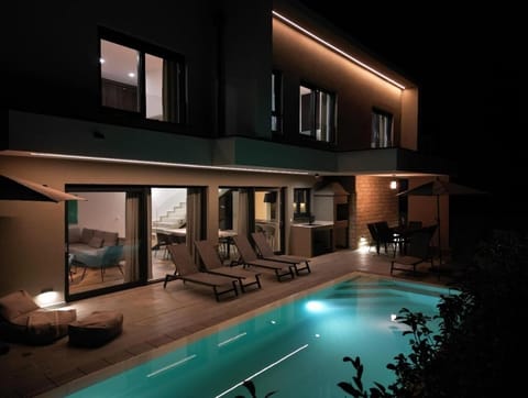 Property building, Night, Swimming pool