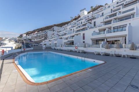 Property building, Living room, Swimming pool