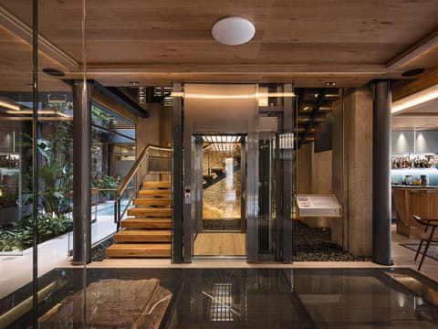 Property building, Garden, View (from property/room), Lobby or reception, Decorative detail, Garden view, elevator