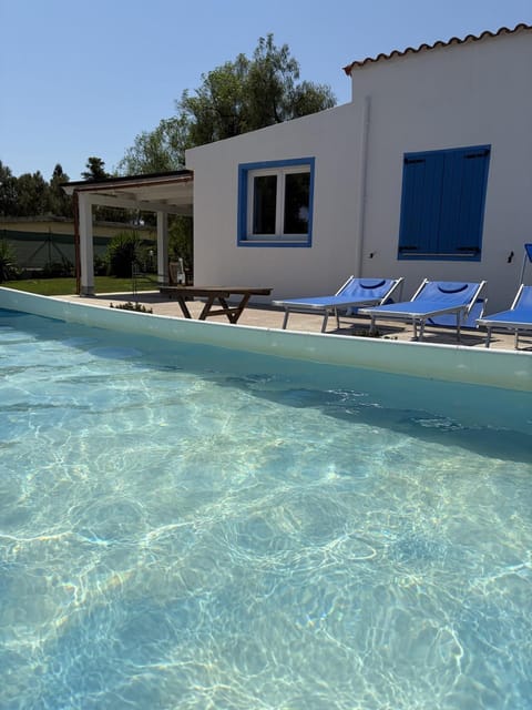 Property building, Day, Pool view, sunbed