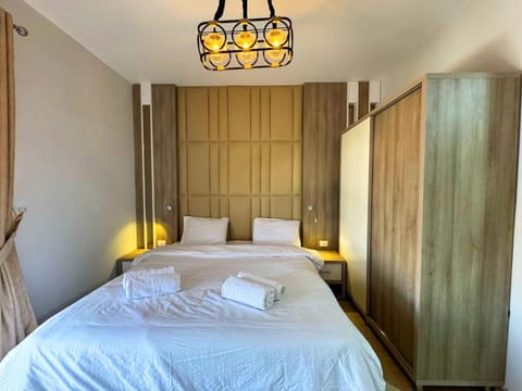 Bed, Photo of the whole room, Bedroom, towels, wardrobe