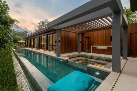 Property building, Seating area, Pool view, Swimming pool, sunbed