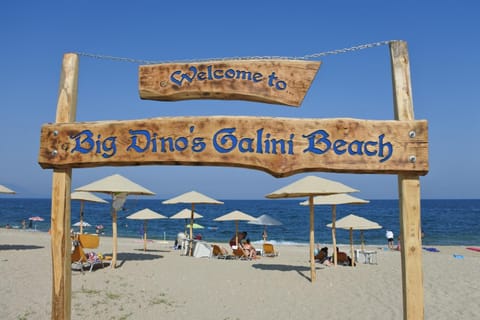 People, Property logo or sign, Natural landscape, Beach, Logo/Certificate/Sign, Text overlay, Sea view, sunbed