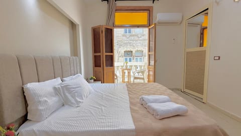 Bed, Photo of the whole room, Bedroom, towels, wardrobe