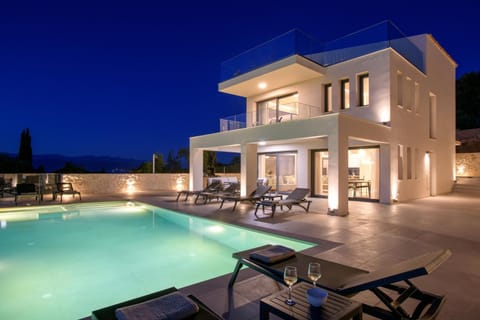 Property building, Patio, Night, View (from property/room), Balcony/Terrace, Pool view, Swimming pool, sunbed