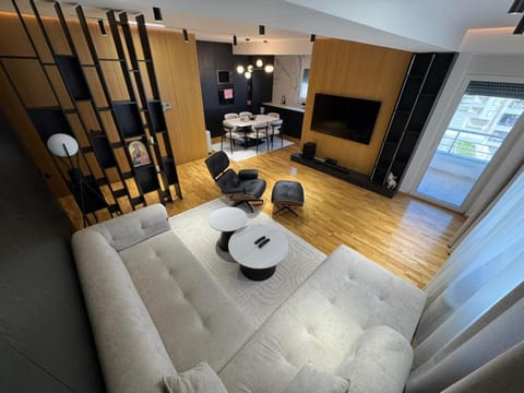 Bed, TV and multimedia, Living room, Photo of the whole room, Seating area, Dining area