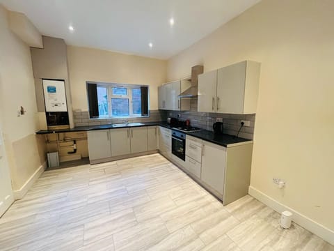 Kitchen or kitchenette, oven