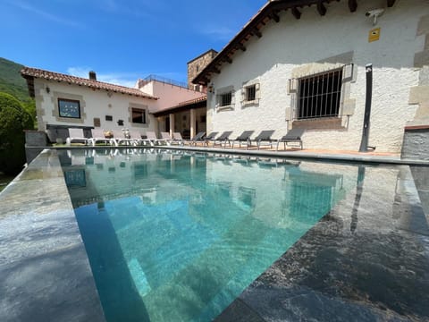 Property building, Living room, Swimming pool