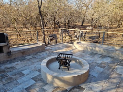 Patio, BBQ facilities, fireplace