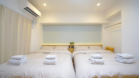 Bed, Photo of the whole room, Bedroom, towels, air conditioner