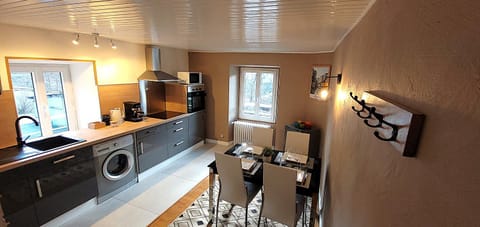 Kitchen or kitchenette, stove, washing machine