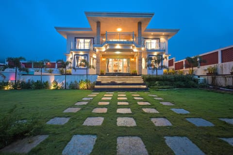 Property building, Patio, Night, Garden, Garden view, Pool view, Swimming pool