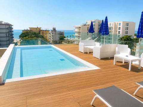Property building, Patio, Day, View (from property/room), Balcony/Terrace, Pool view, Swimming pool