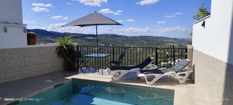 Property building, Living room, Swimming pool