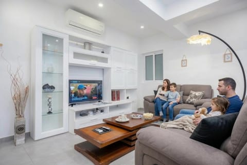 Communal lounge/ TV room, People, TV and multimedia, Living room, Seating area, Evening entertainment, children, Family