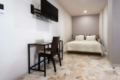 Bed, TV and multimedia, Living room, Seating area, Dining area