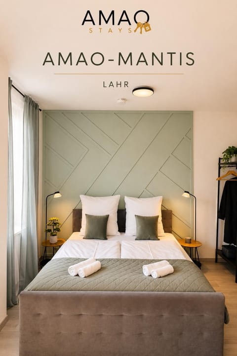 Bed, Photo of the whole room, Bedroom, Text overlay, towels