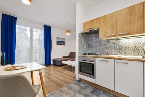Kitchen or kitchenette, Living room, Seating area, Dining area, dishwasher, oven, stove
