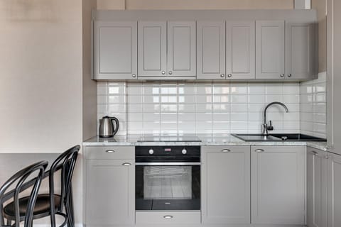 Kitchen or kitchenette, oven, stove