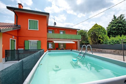 Property building, Living room, Swimming pool