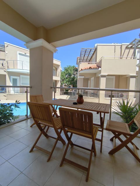 Patio, Balcony/Terrace, Living room, Seating area, Pool view, Swimming pool
