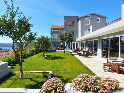 Property building, Patio, Spring, Day, Natural landscape, Garden, View (from property/room), Garden view, Sea view