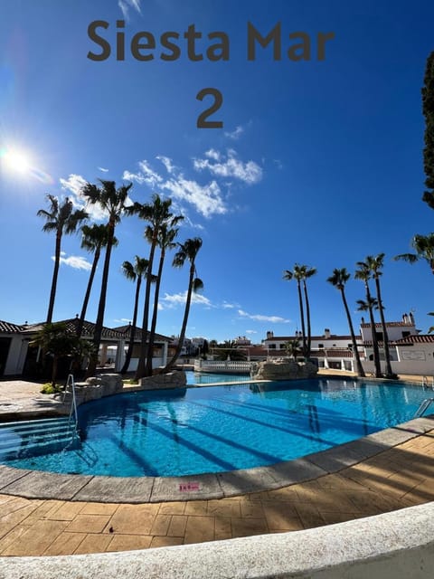 Toilet, Property building, Pool view, Swimming pool