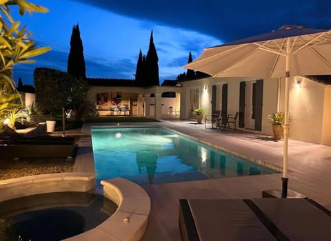 Patio, Night, Pool view, Swimming pool, sunbed