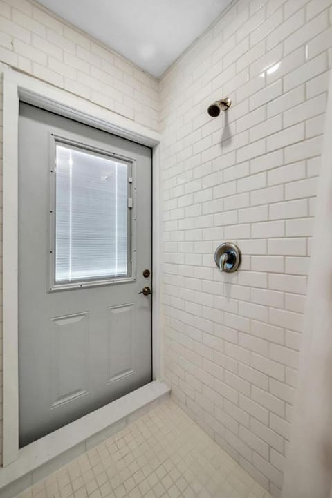 Upcycled Shipping Containers Transformed into a Glamping Home for a Unique Florida Vacation House in Jupiter