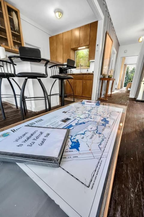 Upcycled Shipping Containers Transformed into a Glamping Home for a Unique Florida Vacation House in Jupiter