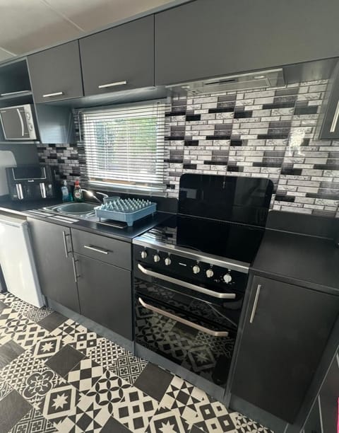 Kitchen or kitchenette, oven, stove