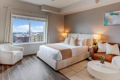 Bed, View (from property/room), Living room, Seating area, Bedroom