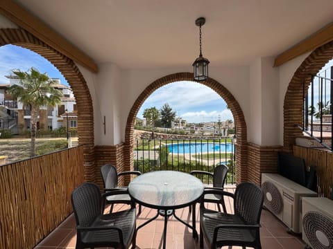Balcony/Terrace, Dining area, Pool view