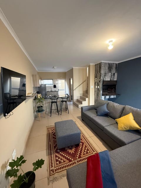 TV and multimedia, Kitchen or kitchenette, Living room, Photo of the whole room, Seating area