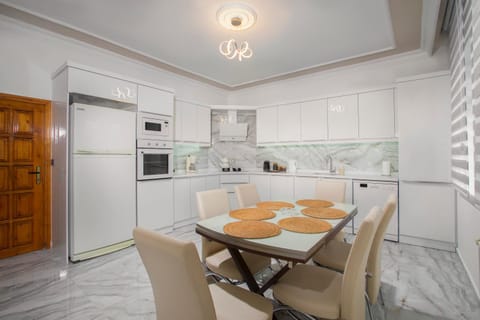 Kitchen or kitchenette, Dining area, dishwasher, microwave, oven, stove, kitchen