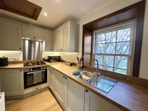 Kitchen or kitchenette, oven, stove, toaster