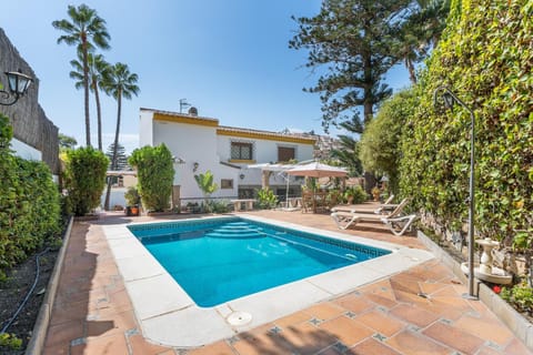 Property building, Living room, Swimming pool