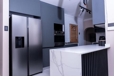 Kitchen or kitchenette, oven, stove